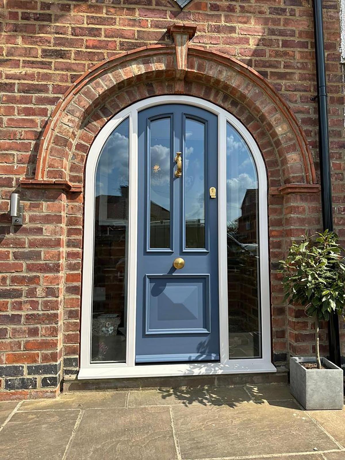 Curve headed door with sidelights