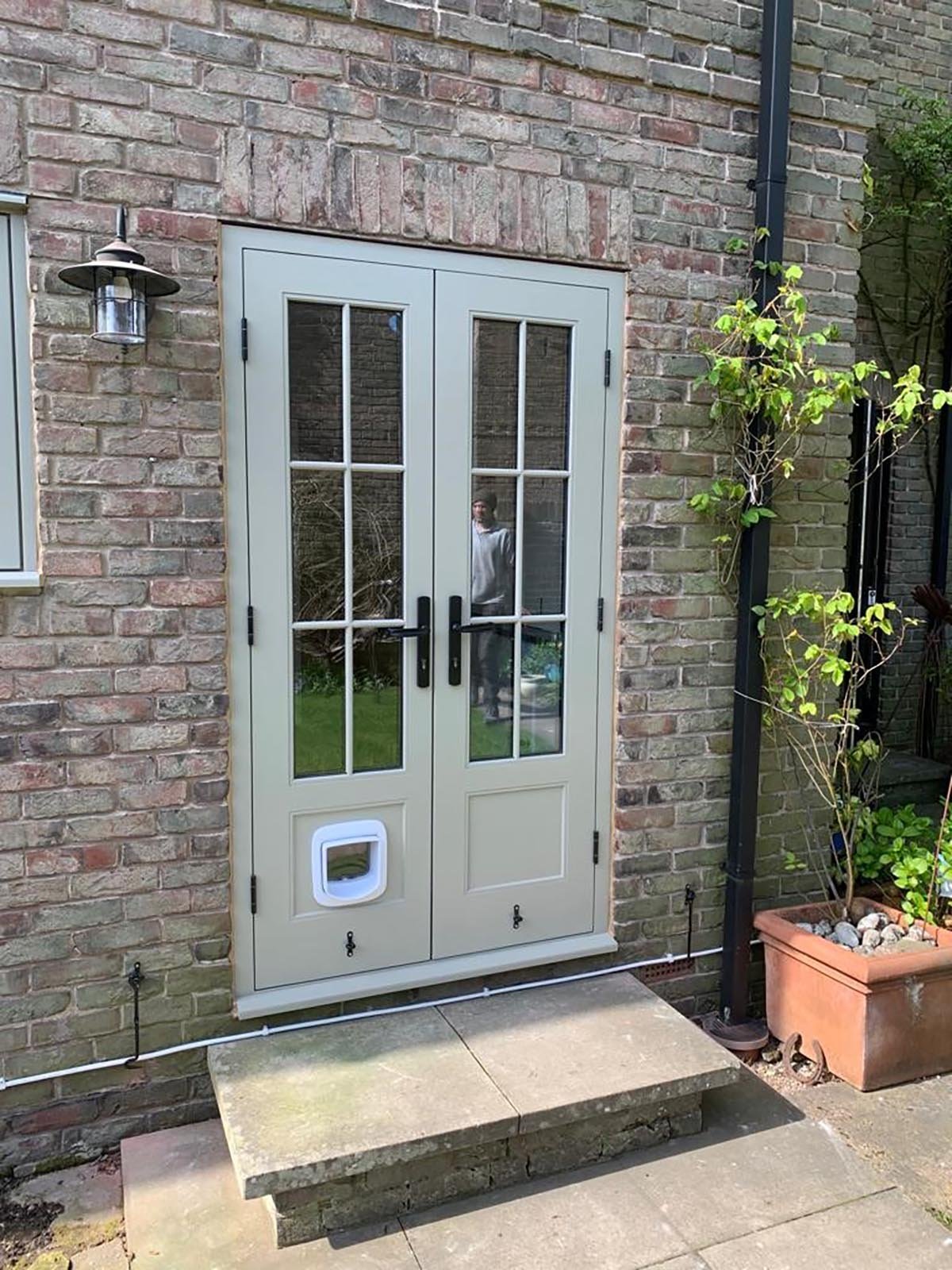 French doors with cat flap